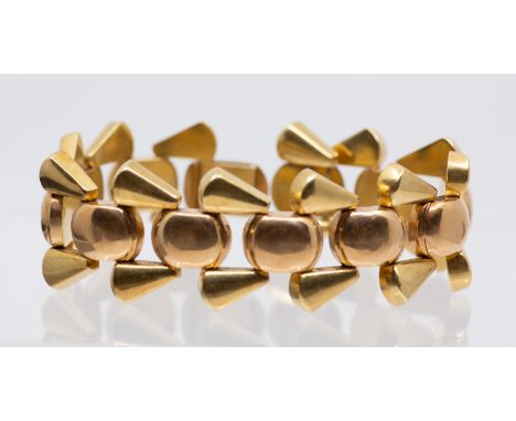 An 18ct gold two tone Modernist bracelet, comprising a central row of oval rose gold hollow  domed links, each approx 13x10mm