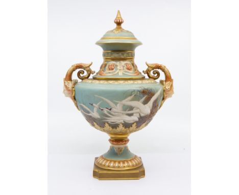 Charles Baldwin: an early 20th Century Royal Worcester porcelain vase and cover, the two handled urn shaped vase with acanthu