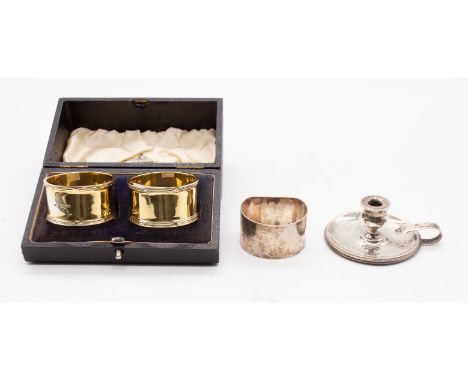 A group of silver to include: a pair of George VI silver gilt napkin rings, with reed and ribbon borders, hallmarked by Walke