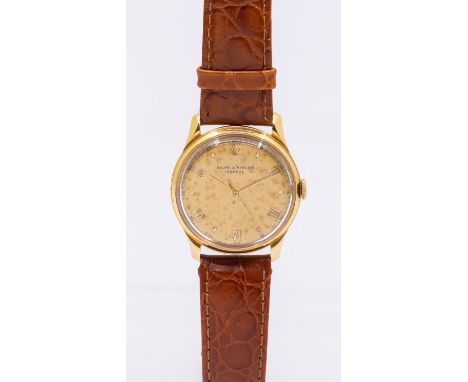 Baume & Mercier- a gentleman's 18ct gold vintage wristwatch, comprising a gilt round signed dial with pained numeral indices,