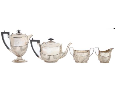 A George V composed four piece silver tea service, initialled S, lidded jug 21.5cm h, by Cooper Bros &amp; Sons Ltd or Atkin 