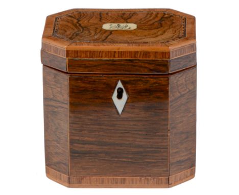 A George III rosewood tea caddy, of cut cornered shape, crossbanded and line inlaid, with ivory escutcheon and initialled tab