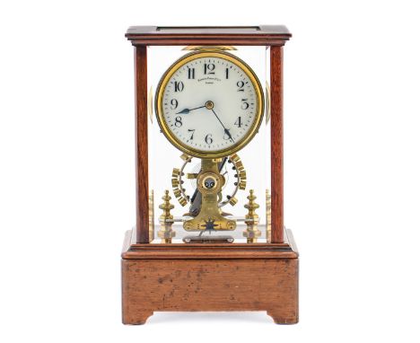 A mahogany four glass electric timepiece, Eureka Clock Co Ltd, London, No 8118, Patent No 14614 1906, c1910, with primrose en