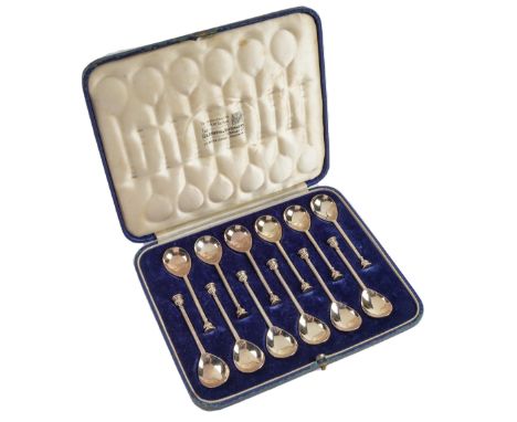 A set of twelve George V silver seal top replica coffee spoons, by The Goldsmiths &amp; Silversmiths Co Ltd, Sheffield 1935, 