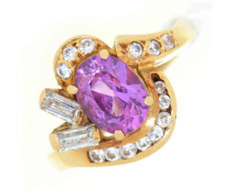 An amethyst and diamond cluster ring, in gold marked 750, 5.7g, size J½ ConditionGood condition