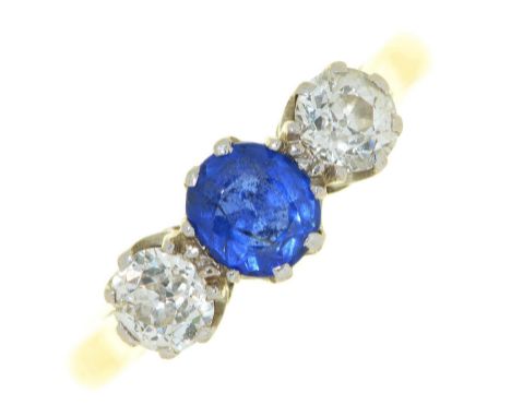 A sapphire and diamond three stone ring, with old cut diamonds, gold hoop marked 18ct PLAT, 3.9g, size M½ ConditionGood condi