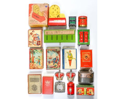 Sixteen tinplate and other banks, first half 20th c, lithographed in colour or painted, to include miniature safes crown shap