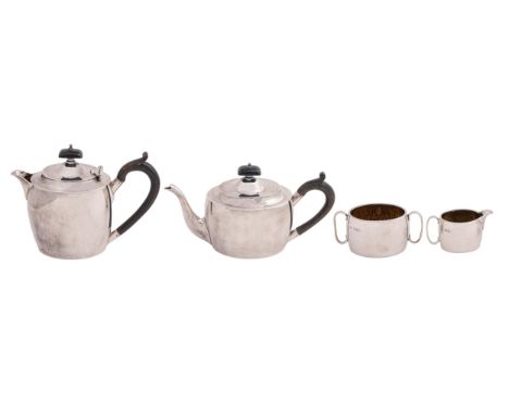 A Victorian silver plain oval four piece bachelor's tea service, lidded jug 14.5cm h, by Holland, Aldwinckle &amp; Slater, Lo