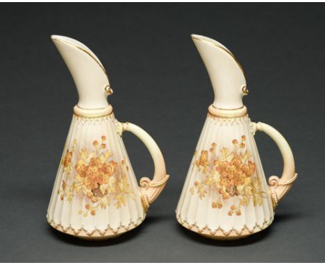 A pair of Royal Worcester fluted ewers, 1891, decorated in predominately yellow with naturalistic flowers and gilt on a tinte