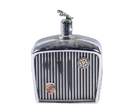 Motoring interest. A chromium plated metal and black plastic motor car radiator novelty spirit flask, c1960, with jaguar stop