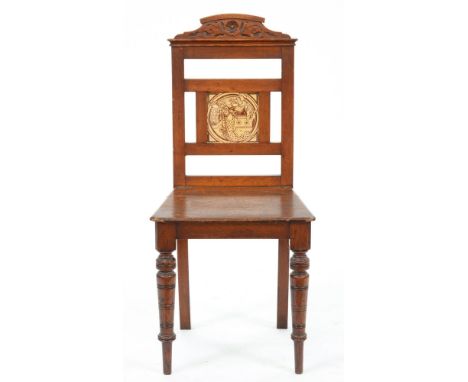 A Victorian oak hall chair,Â&nbsp;the back inset with a Minton tile, designed by John Moyr Smith, seat height 43cm ConditionJ