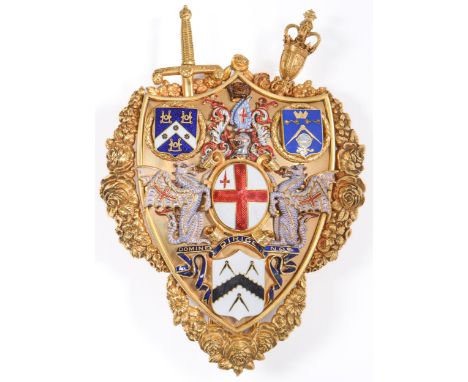 A giltmetal and enamel badge, early 20th c, of shield shape, applied with the arms of the City of London and three other smal
