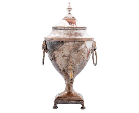 A Sheffield Plate tea urn, c1800, of shield shape with ventilated cover and reeded rims, lion masks and ring handles, 36cm h 