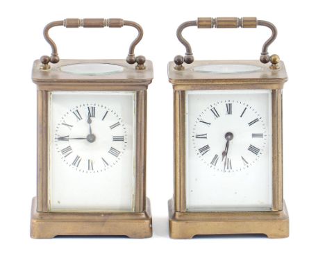 Two French brass carriage timepieces, early 20th c, of similar form, 11cm h excluding handle ConditionBoth in apparently work