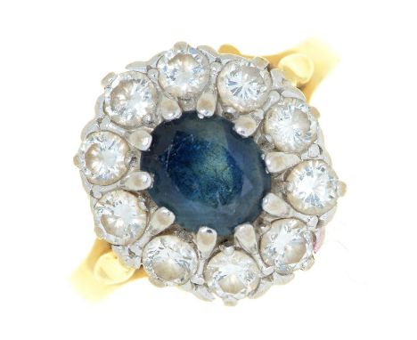 A sapphire and diamond cluster ring, in 18ct gold, Convention marked, 5.5g, size N ConditionGood condition