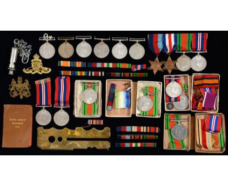 1939-1945 War Medal, Defence Medal and WWII stars,Â&nbsp;several attributed, in card boxes (15) and miscellaneous cap badges,