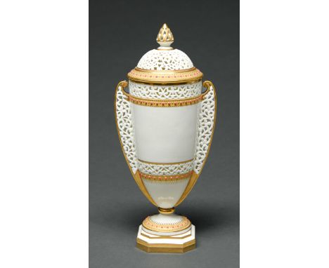 A Grainger's Worcester reticulated vase and cover, c1890, with jewelled gilt borders, 29cm h, printed mark, early retailer's 