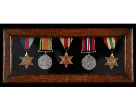 1939-1945 Star, Africa Star, Italy Star, Defence Medal and War Medal, oak frame Condition