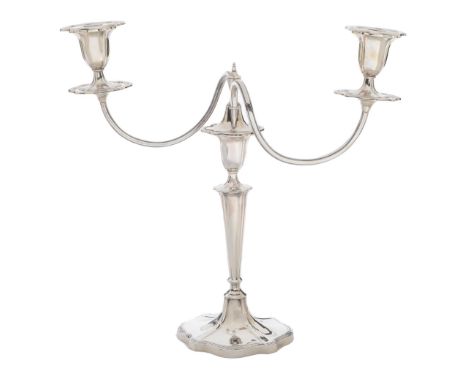 An Elizabeth II silver candelabrum, with reeded branches and rims, 34.5cm h, by Walker &amp; Hall Ltd, Sheffield 1961, branch