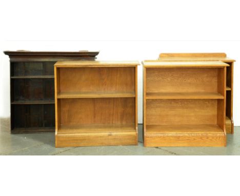 Three light oak open bookcases, mid 20th c, each with fixed shelf, the back of plywood, 90cm h and circa, 34 x 86cm and circa