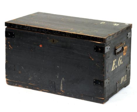 A black painted pine trunk, early 20th c,Â&nbsp;with steel hinges, lock and four bolts, white painted owner's initials to eit