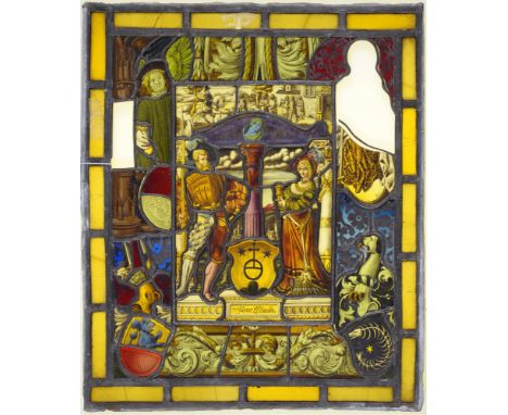 A Northern European window light, composed of fragments of 17th c and later stained glass around a shield of arms, the subjec