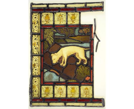 A Victorian stained glass window light of a dog gazing at it's reflection in water, 52 x 37cm, unframed ConditionDamaged and 