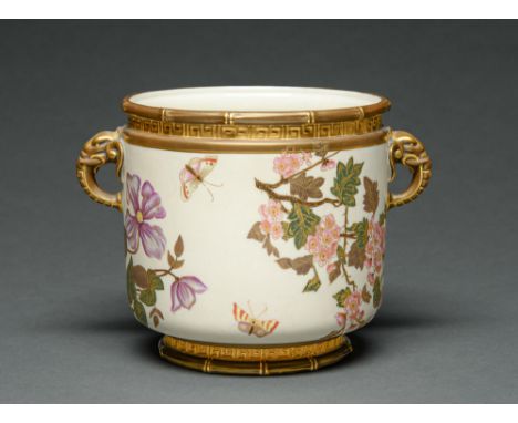 A Royal Worcester elephant handled jardiniere, 1883, decorated with butterflies amidst flowering boughs on an ivory ground be