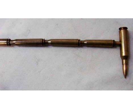 Military Interest, a trench art Walking Stick made of nine brass shell cases from a Spitfire, 88cm long 