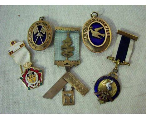 A small collection of five Masonic Jewels, Limestone Rock Lodge No 369 including two oval silver gilt and blue enamel cushion