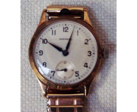 A 1950's Garrard Vintage Gentleman's Wrist Watch, mechanical wind, 27mm silvered dial with Arabic numerals, subsidiary second