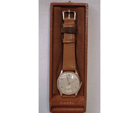 An Omega 9ct gold cased Gentleman's Vintage Wrist Watch, mechanical wind silvered dial with Arabic numerals at even numbers, 
