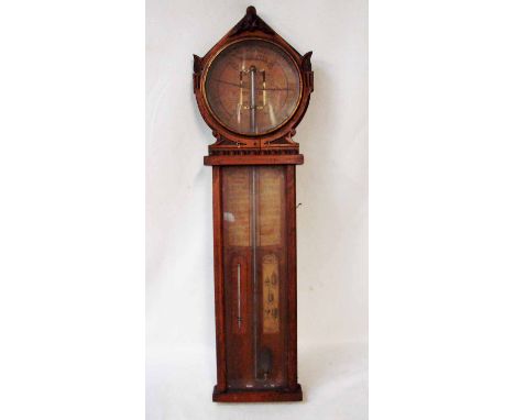 A Victorian oak cased circular dial Polytechnic Barometer Thermometer by Joseph Davies and Company with paper dial and Admira