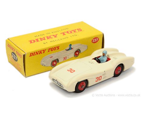 Dinky 237 Mercedes Racing Car - pale cream (off-white), red interior and ridged hubs with black treaded tyres, light blue fig