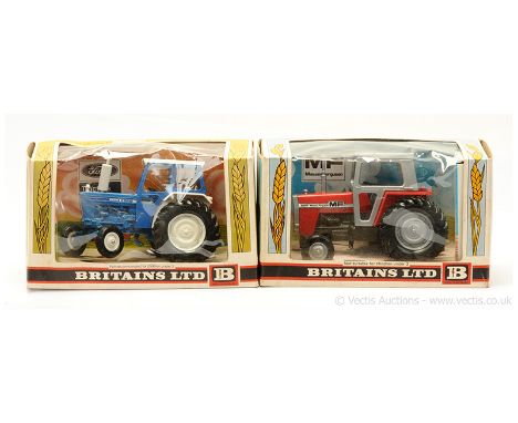 Britains 9522 Massey Ferguson 595 Tractor - red, grey - Near Mint in a Good to Good Plus (slight crushing to cellophane) corn
