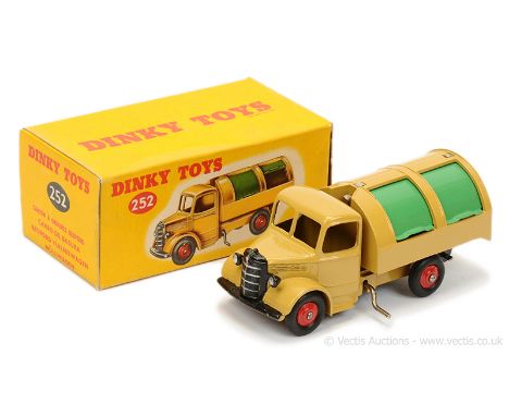 Dinky 252 Bedford Refuse Wagon - light tan cab, chassis and back with green tinplate side sliding opening doors, red ridged h