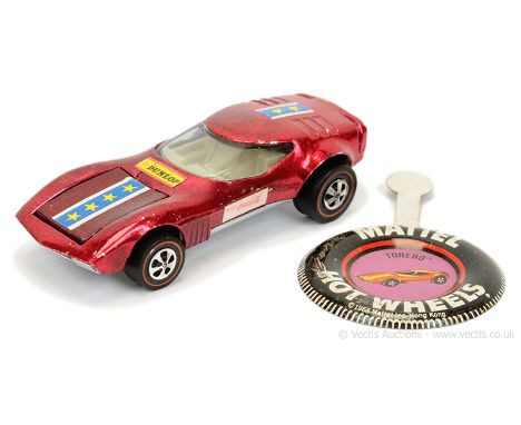 Hot Wheels (Mattel) Redline 6260 Torero - metallic magenta, with white, blue and yellow stars and stripes labels plus others 