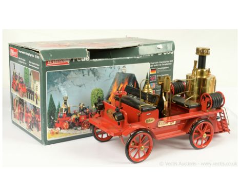 Wilesco D305 Steam Fire Engine - scarce tinplate Live Steam model is red, with black wooden seats, brass boiler and fittings,