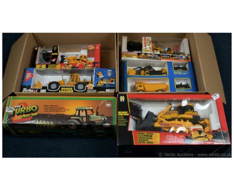 A mixed group of remote-control vehicles and similar to include Turbo Cat Wheel Loader, The Turbo Track-990 3-piece Farm Set,