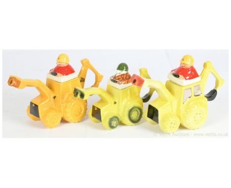 Carlton Ware group of JCB Teapots; (1) dark yellow with driver figure; (2) lighter yellow; (3) Carlton Ware or similar unmark