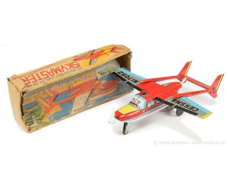 Yanoman (Japan) "Cessna 336 Skymaster" tinplate model Aircraft - friction drive with linkage to rotating propellers front and