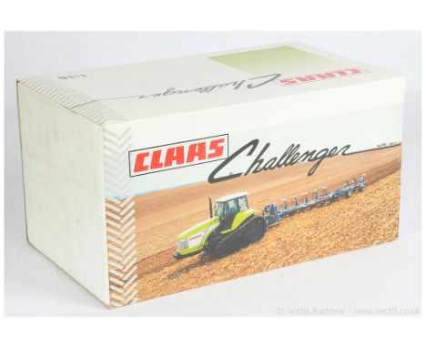 NZG 426/01 Claas Challenger 1/16th scale Tractor - green, off white, black with moving rubber tracks - Mint with inner packin