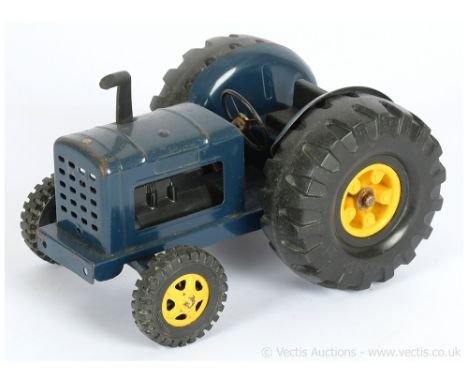 Tonka (New Zealand) pressed steel Farm Tractor from the 1960's/70's period - dark blue with black plastic tyres to the yellow