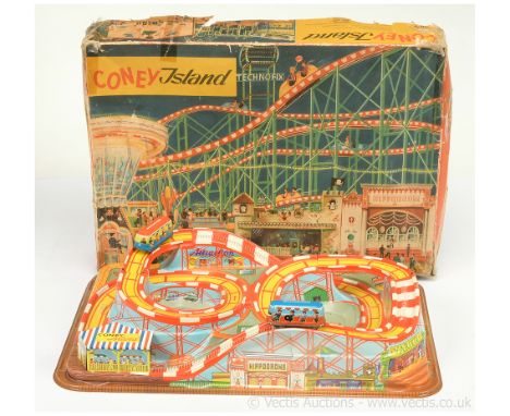 Technofix (Germany) No.307 "Coney Island" Calypso Big Dipper Ride - colourfully formed plastic layout with 2 x tinplate clock