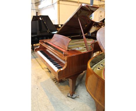 Reid Sohn (c1986)A grand piano. AMENDMENT Is a 6ft 8in Model 205 grand piano in a light mahogany case on an 'A' frame.