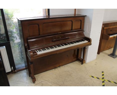 Steinway (c1929) A Model K upright piano in a mahogany case; together with a stool.