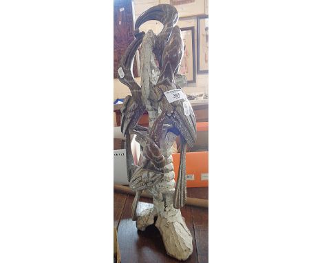 African carved stone sculpture of birds on a tree trunk (A/F)