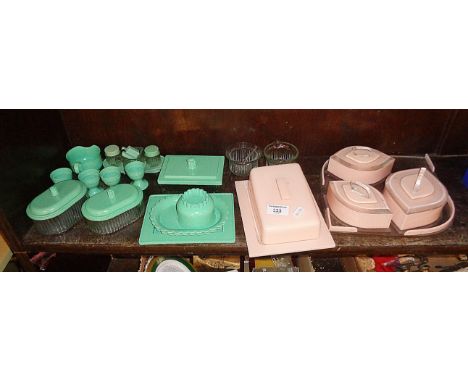 Collection of assorted Art Deco coloured lucite and perspex plastic items, including dressing table set, butter dish, cruet s