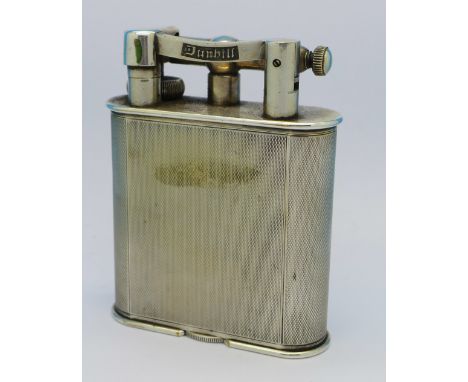 A Dunhill table lighter, bears inscription, dated 1954