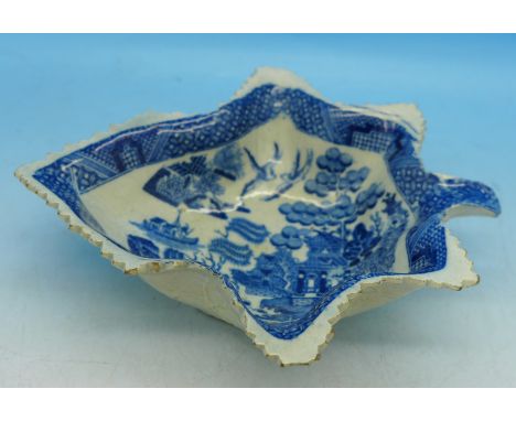 A Caughley porcelain willow pattern leaf shaped pickle dish